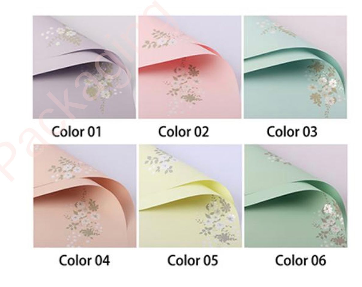 Six sheets of paper in different colors with floral patterns on a light gray background.